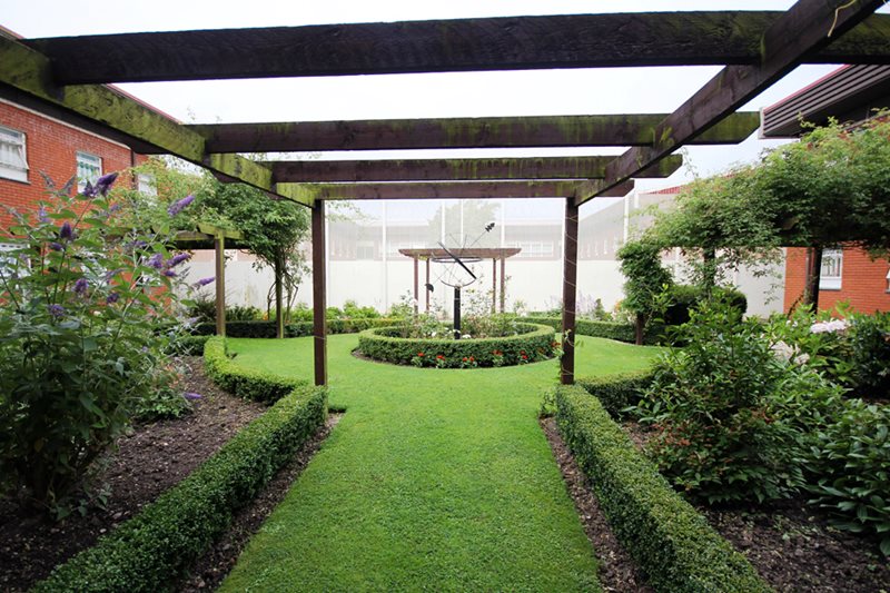 Garden at HMP Wymott with pergola and sculpture Garden at HMP Wymott with pergola and sculpture